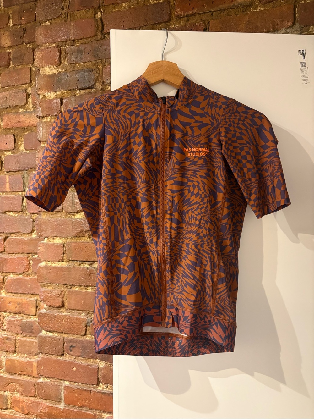 Pas Normal Studios Men’s Checkered Orange & Purple Cycling Jersey